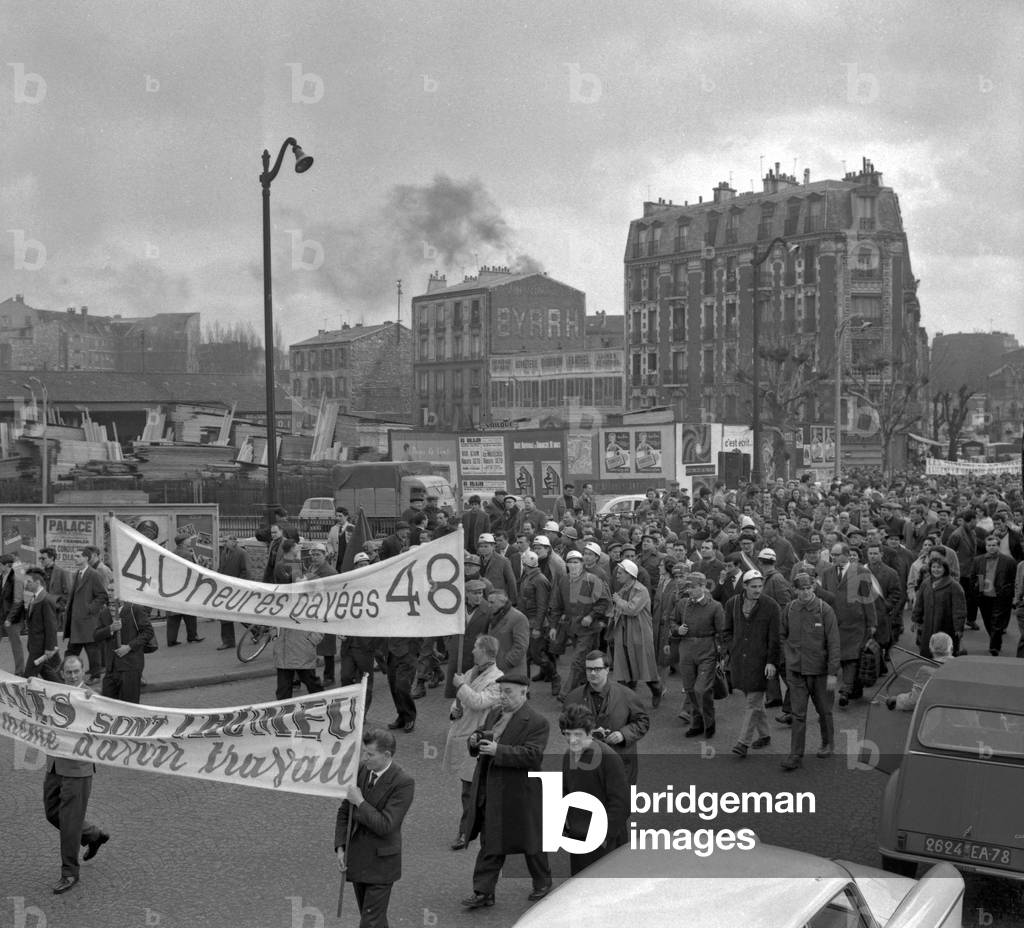 Demonstration of miners from Lorraine between Pantin and the Invalides in Paris for a 4th week of annual paid leave on March 13, 1963, France (b/w photo)