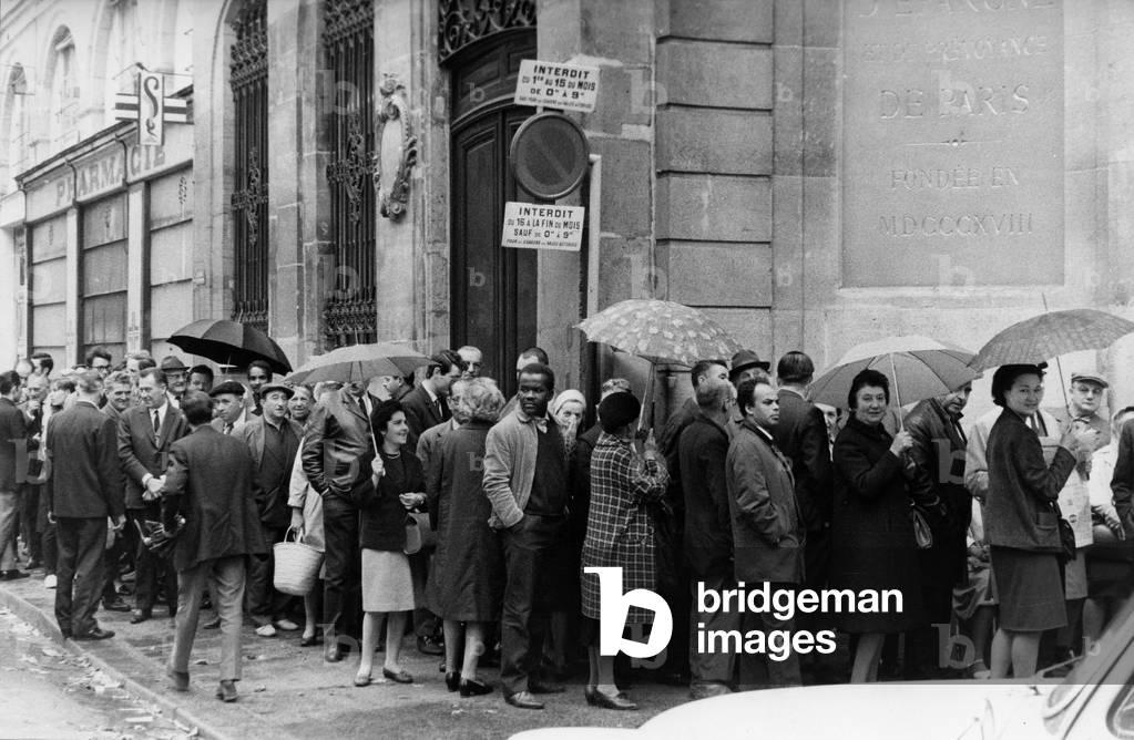 Queue in front of La Caisse D'Epargne Rue Du Louvre May 25, 1968 (b/w photo)
