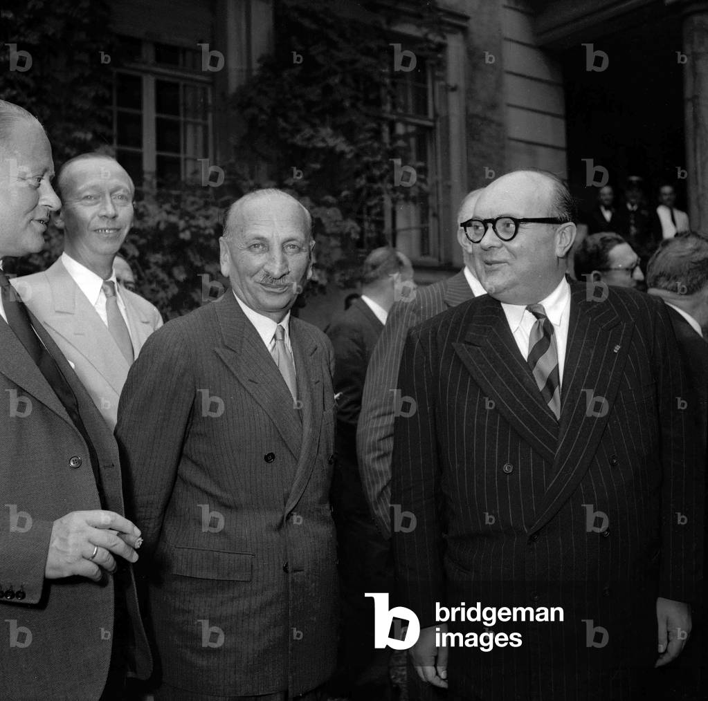 Just before the 1st meeting of the Council of Europe, meeting of the Committee of Ministers of the Council of Europe in Strasbourg, France, August 1949 : Paul Henri Spaak, Gustav Rasmussen, Necmettin Sadak and Dirk Stikker (b/w photo)