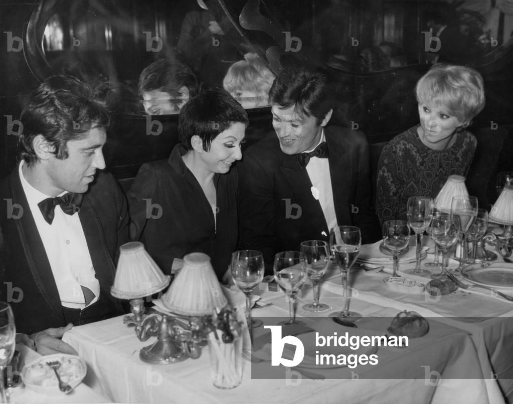 Sacha Distel, Zizi Jeanmaire, Alain Delon and Mireille Darc at Maxim'S Restaurant After Dress Rehearsal of Zizi Jeanmaire at The Olympia on November 15, 1968 (b/w photo)