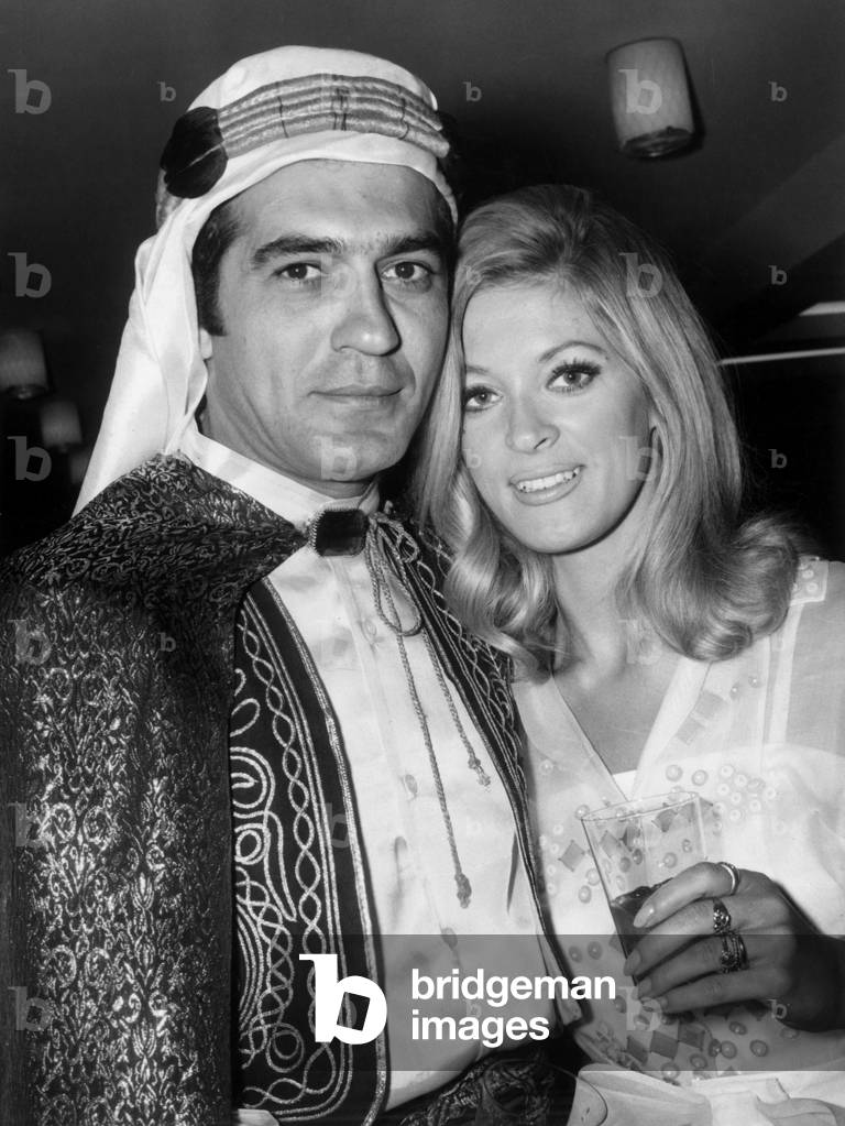 During The Cocktail On The Champs Elysees Sarah Stephane And Fikret Hakan On September 6, 1968 (b/w photo)