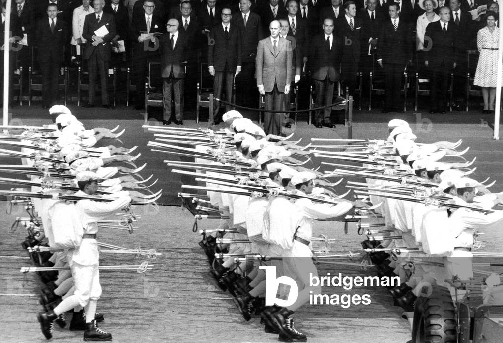 Military Parade For Bastille Day in Paris, on The Tribune Are French President Valery Giscard D' Estaing , Edgar Faure , Jacques Chirac , Alain Poher and Jacques Soufflet Minister of Defence July 14, 1974 (b/w photo)