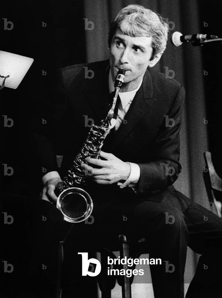 Marcel Amont Playing The Saxophone during his Show at The Olympia, Patis, January 1967 (b/w photo)