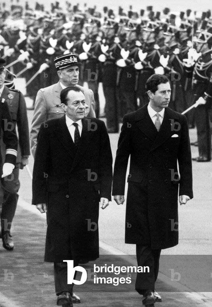 French Prime Minister Michel Rocard and Prince Charles (Future Charles III) of England during Military Review at Airport, November 7, 1988 (b/w photo)