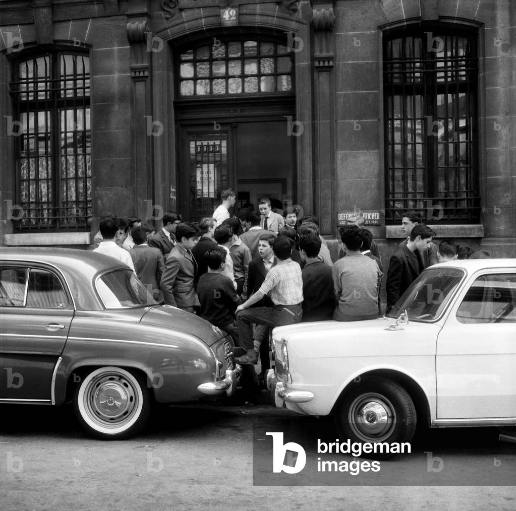 Young Candidates After Examination of Basic School-Leaving Qualification, Paris, June 14, 1962 (b/w photo)