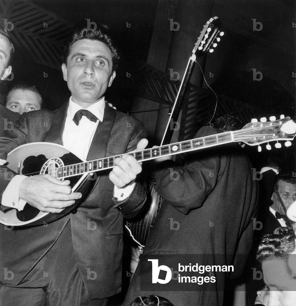 Gilbert Becaud at Cannes Festival May 10, 1960 (b/w photo)