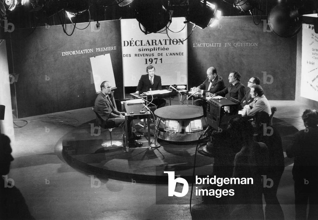 Valery Giscard D'Estaing (L) Facing Four Journalists Pierre Meutey, Georges Fillioud, Raymond Bourgine, Jean Ferniot, and in The Center Host Etienne Mougeotte during Tv-Program 