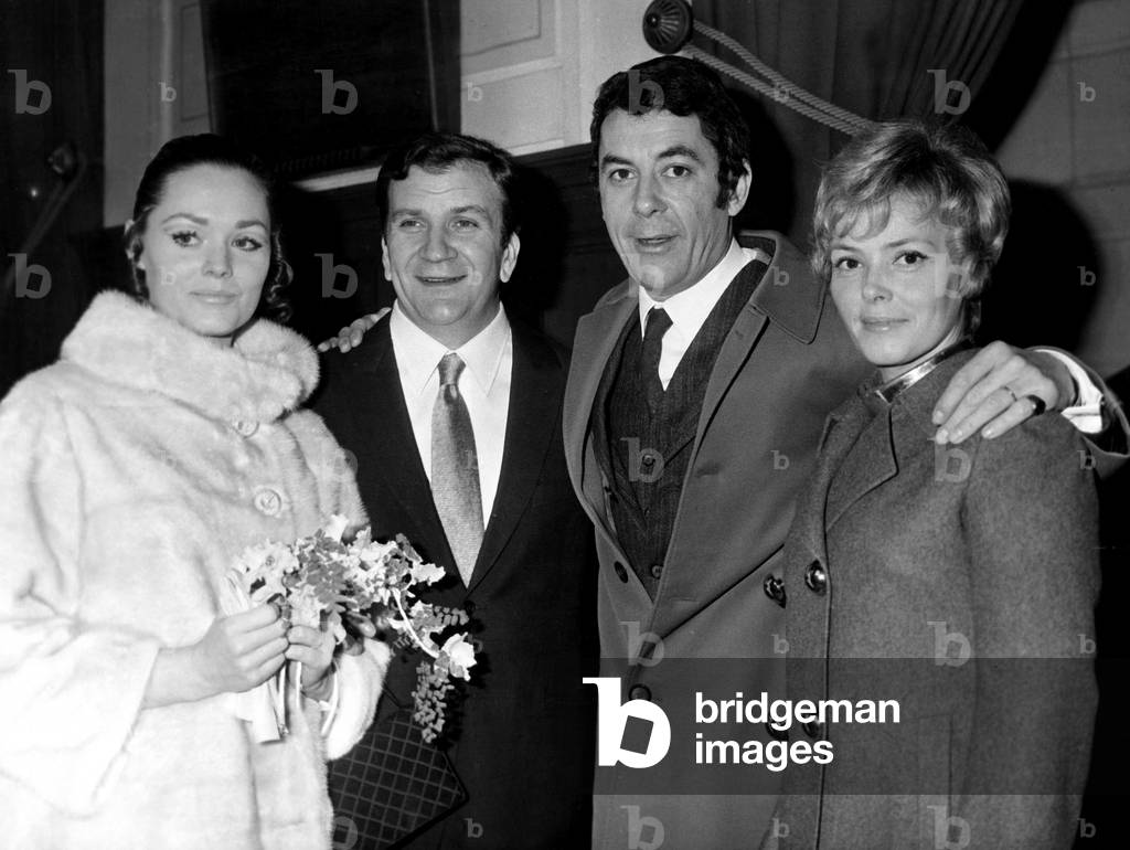Philippe Nicaud and his Wife Christine Carrere Attending The Civil Wedding of Pierre Mondy and Annie Fournier in Paris December 16, 1967 (b/w photo)