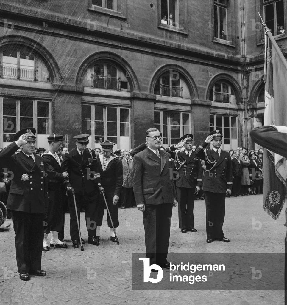 French Captain Jean L'Herminier receiving the plate of 