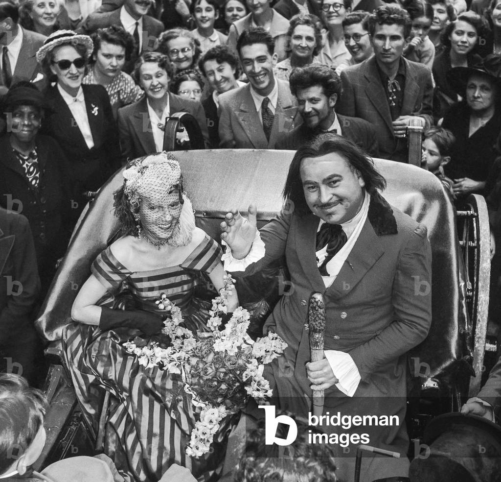 The Balzac day in Saint Germain des Pres in Paris, June 17, 1950 : Honore de Balzac (Mr Suaret) and the Duchess of Langeais (Alice Cocea) (b/w photo)