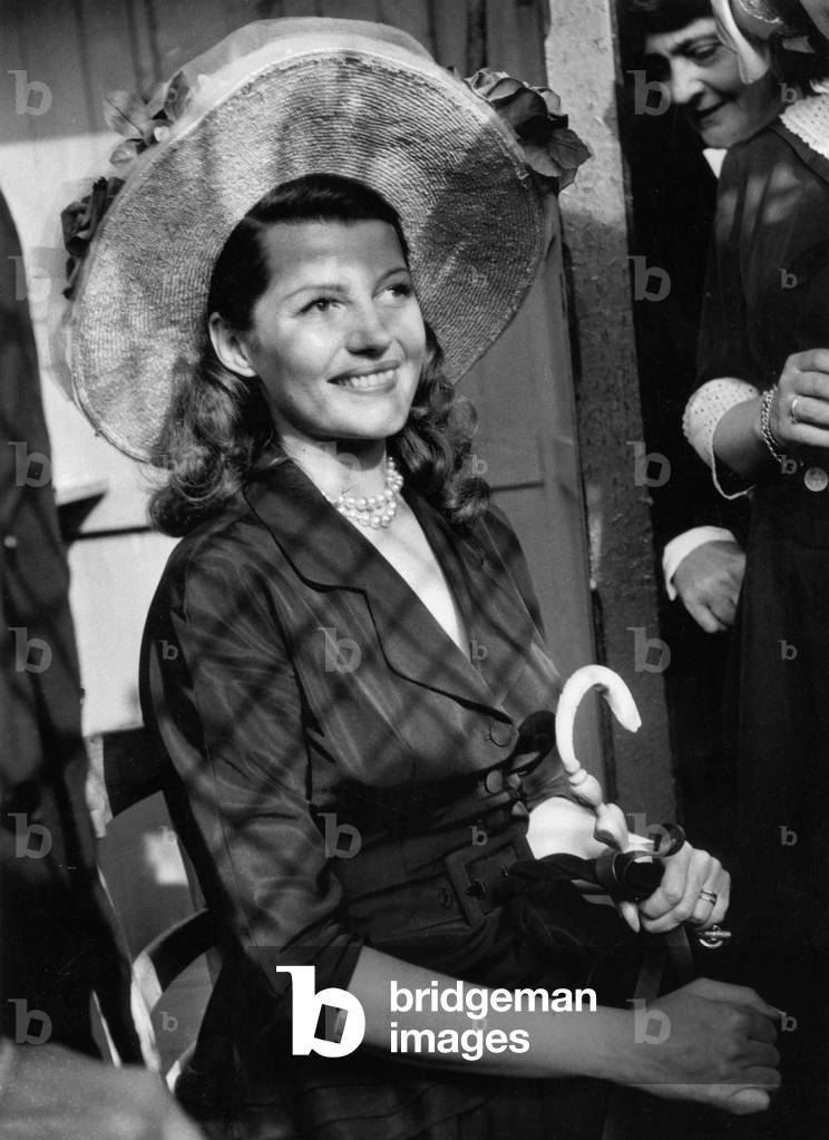 Actress Rita Hayworth at Longchamp Racecourse (France) on June 26, 1949, She'S Resting After Feeling of Faintness (She'S Pregnant) (b/w photo)
