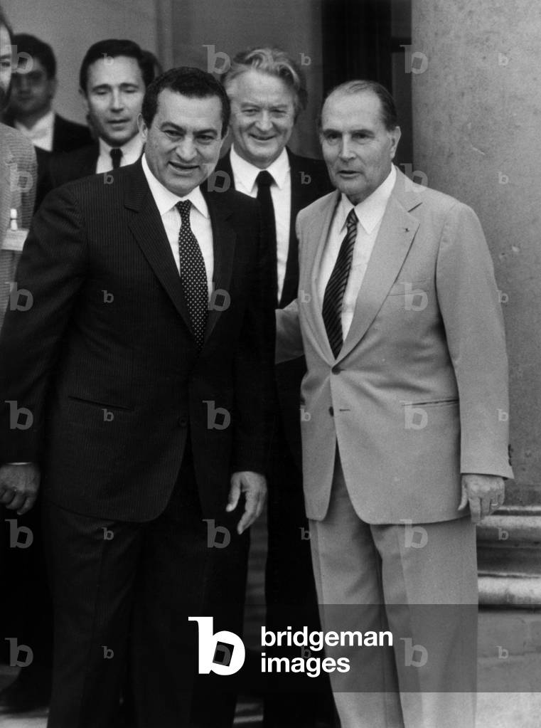 Hosni Moubarak, Roland Dumas (Ministry of Foreign and European Affairs) and Francois Mitterrand at The Elysee Palace, September 30, 1985 (b/w photo)
