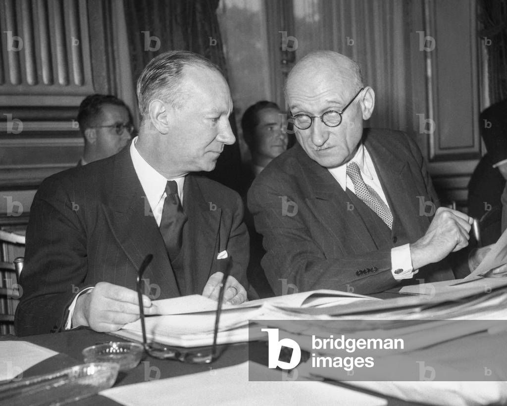 Meeting of the council of the Organisation for European Economic Co-operation (OEEC) in Paris on October 31, 1949 : Alexandre Parodi and Robert Schuman (France) (b/w photo)