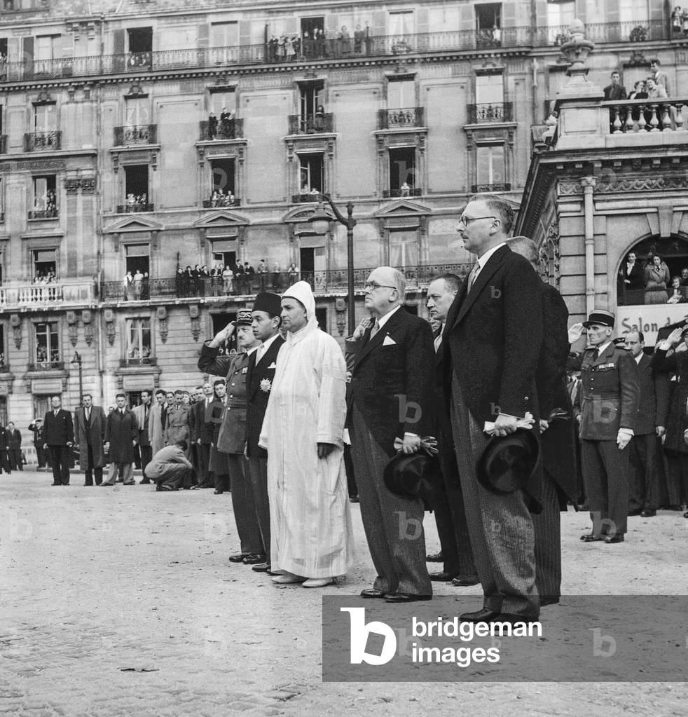 Visit in Paris of Sultan of Morocco Sidi Mohamed Ben Youssef  (Mohamed V) on October 10, 1950 : here arriving in Paris Moulay Hassan (future king Hassan II), Sultan of Morocco Sidi Mohamed Ben Youssef, French president Vincent Auriol and Rene Pleven (b/w photo)