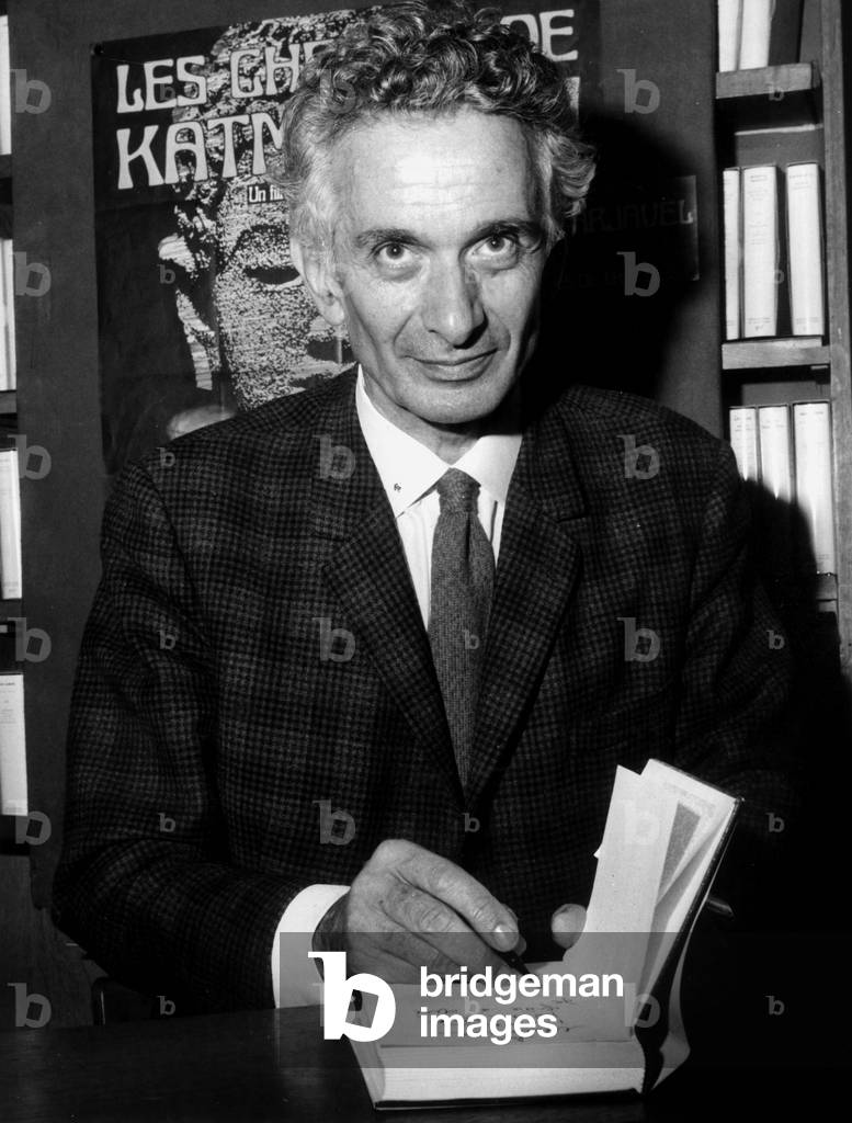 French Novelist Rene Barjavel Dedicating his Book 