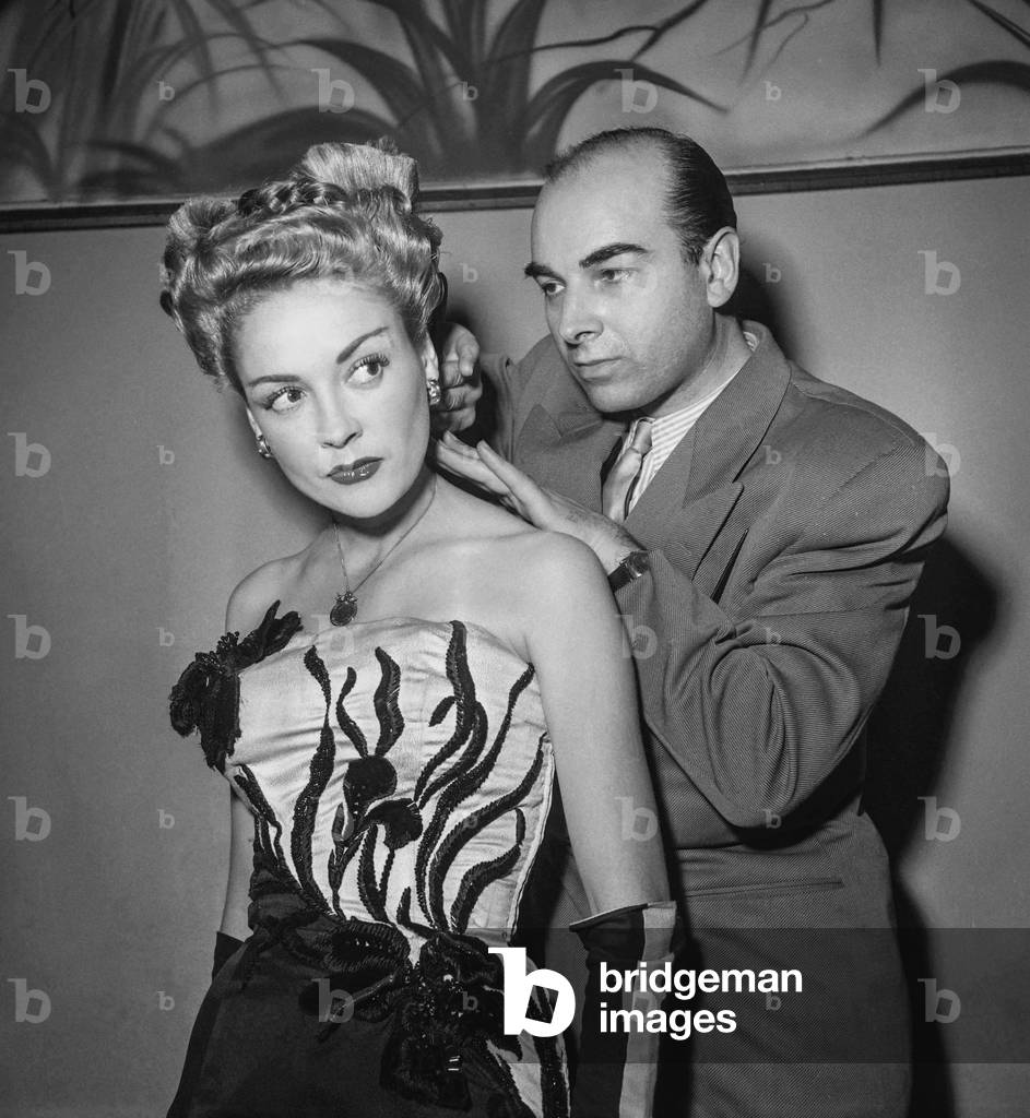 Hairstyle exhibition, Paris, May 21, 1950 : French hairdresser Rene Clement and model 