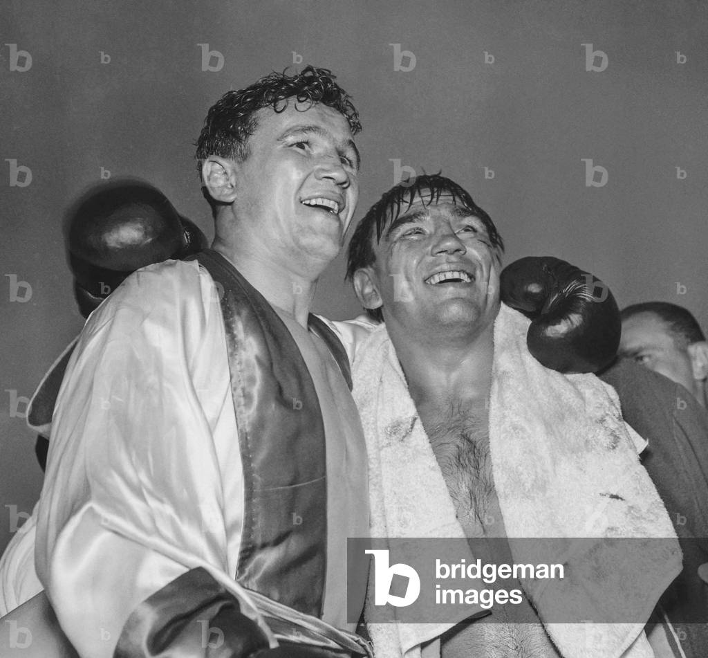 French boxers Robert Villemain and Laurent Dauthuille after their fight in Montrouge, France, June 9, 1951 (b/w photo)