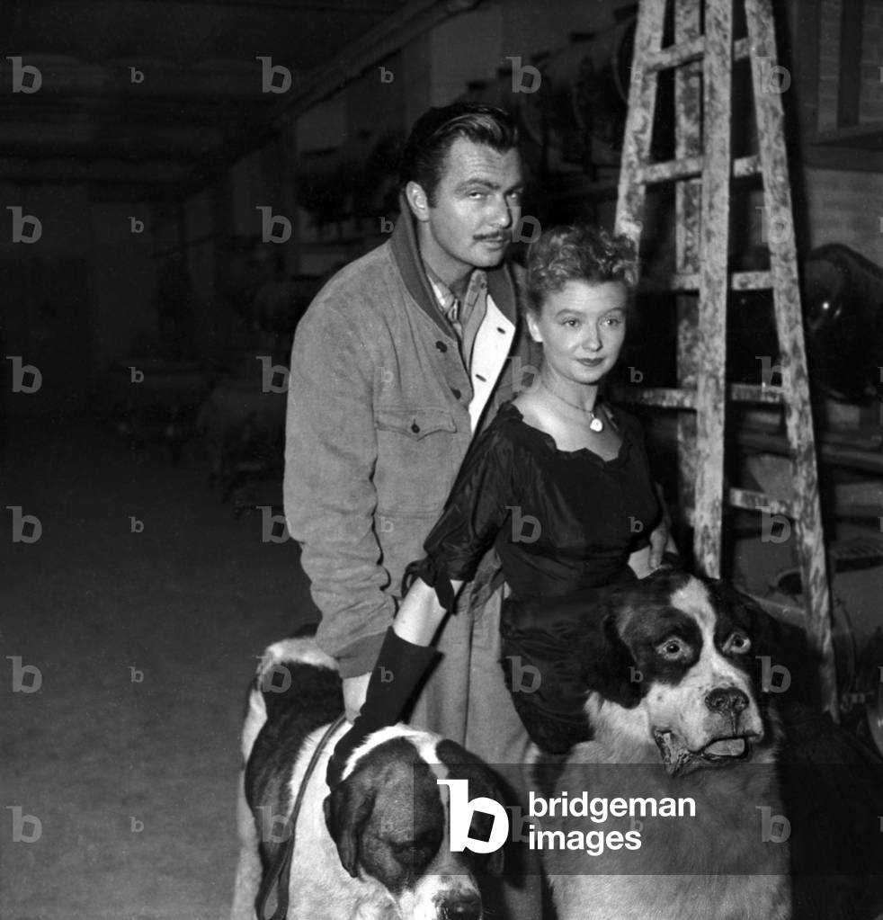 Gerard Landry and Simone Valere, With 2 Dogs, November 9, 1948 (b/w photo)