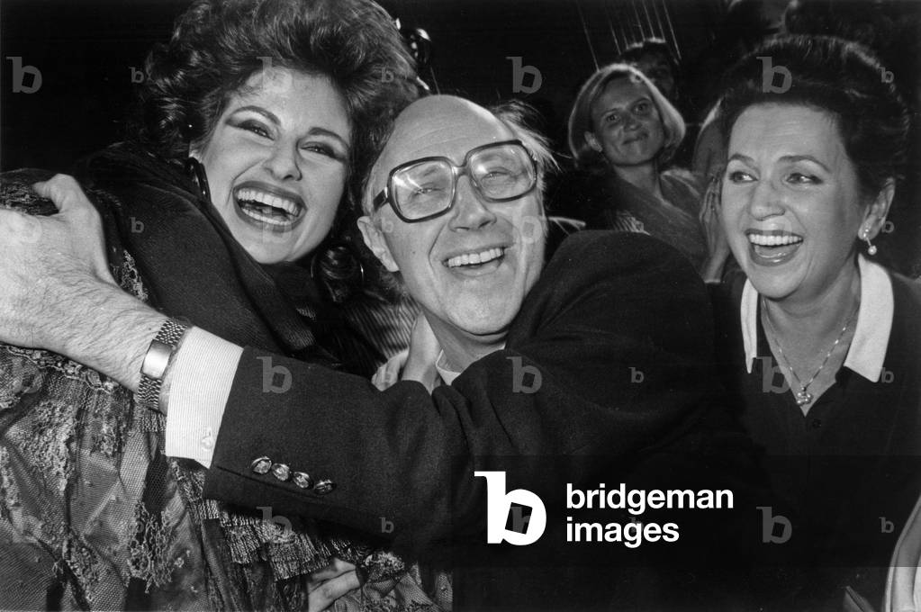 Olga Rostropovitch At The End Of The Presentation Of The New Haute Couture Collection Autumn Winter 82/83 Chez Lanvin Ou Elle Has Defile Felicite By Her Father Mstislav Rostropovich And Her Mother Galina Vichnevskaia On July 27, 1982 (b/w photo)
