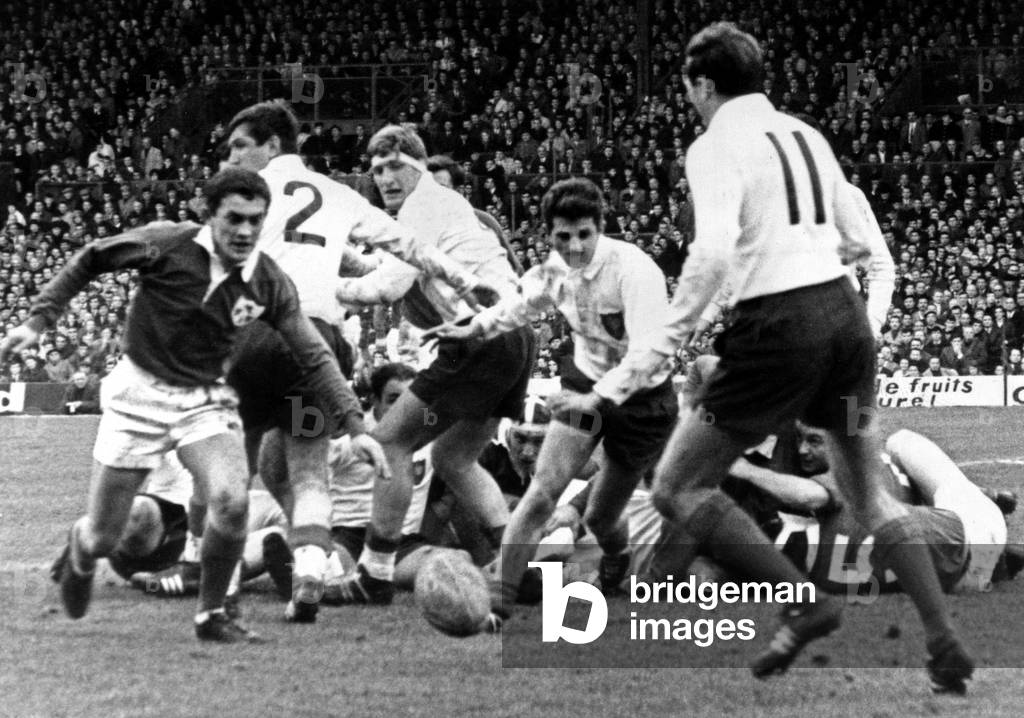 Rugby Match For Five Nations Championship in Colombes Near Paris on January 29, 1966 : France - Ireland (French Victory) : here Irish Young (L) and French Christian Darrouy Are Going Towards The Ball (b/w photo)
