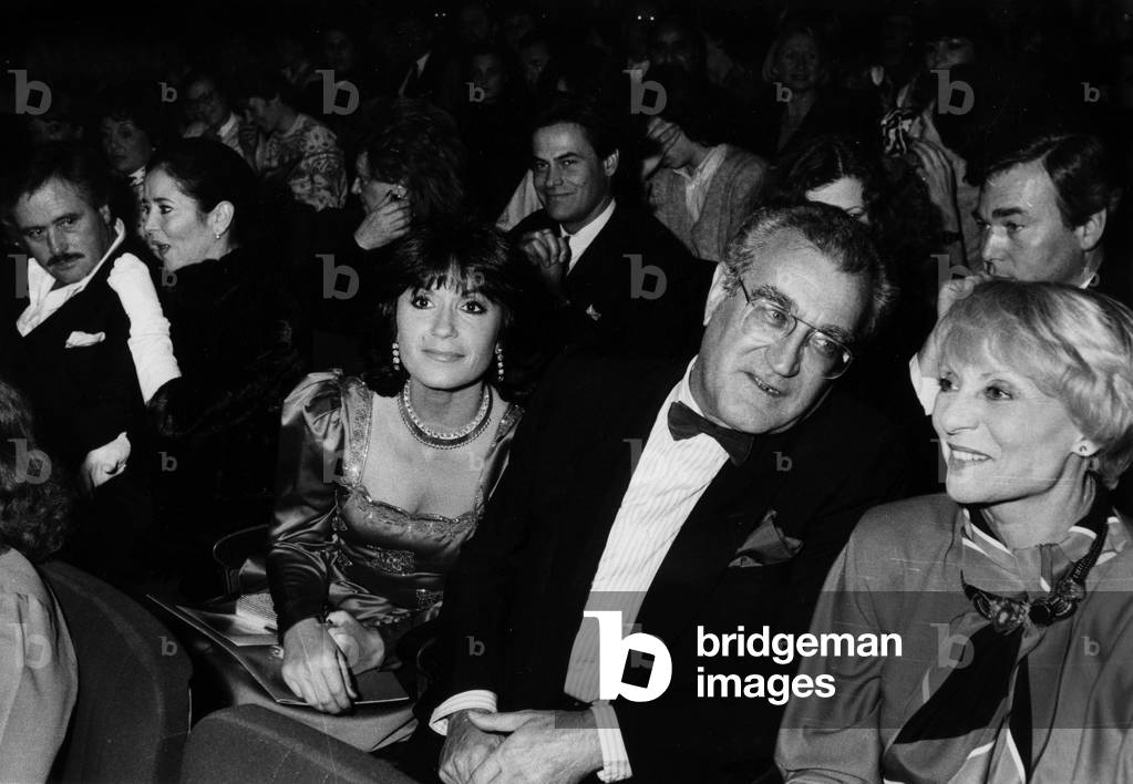 French French Secretary of State For Communication Georges Fillioud and his Wife Daniele Evenou at Olympia, Paris, For Enricomacia' Concert March 8, 1985. on L : Victor Lanoux and Marie Jose Nat. on R : Annie Cordy (b/w photo)