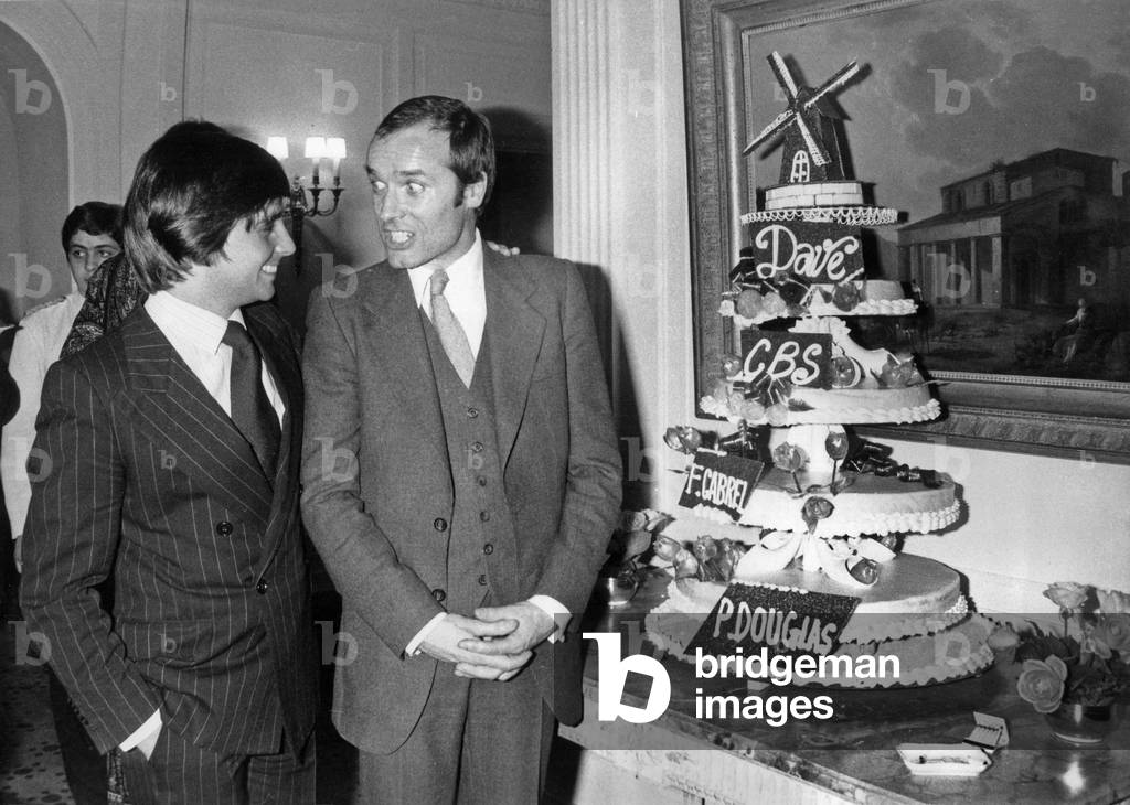 French Humorists Thierry Le Luron and Pierre Douglas at Dinner After Premiere of -Dave at The Olympia in Paris, December 15, 1977 (b/w photo)