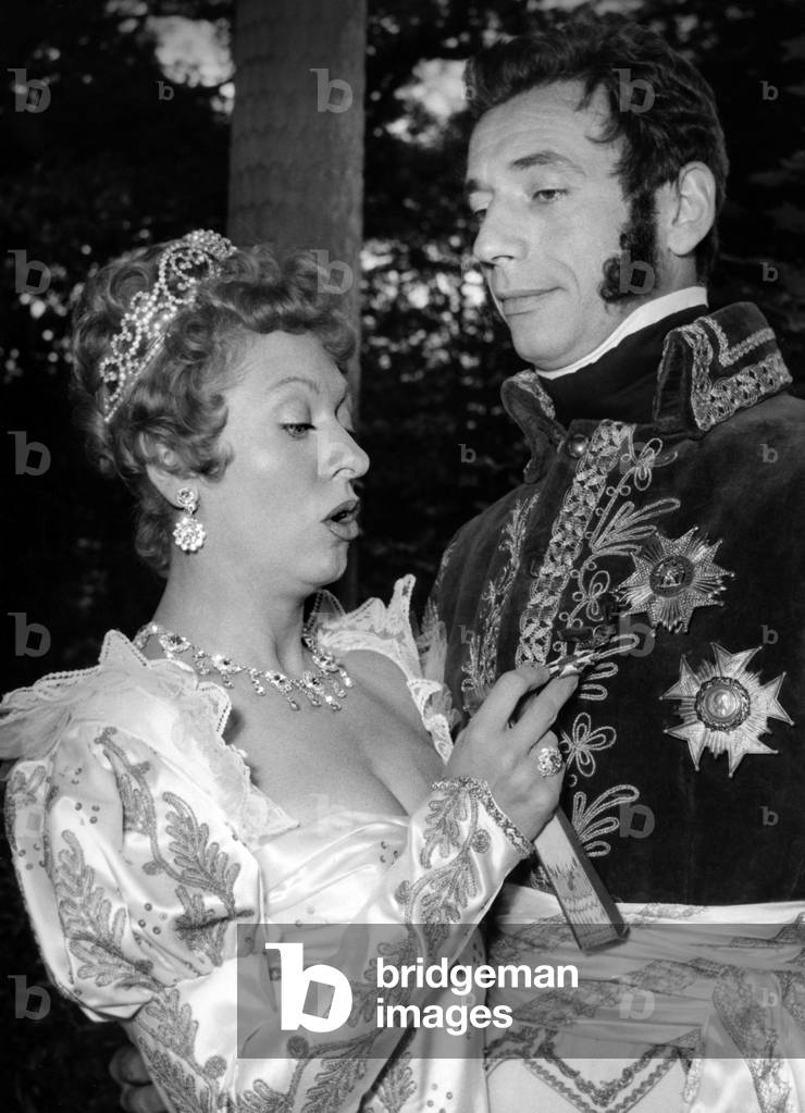 Patachou And Yves Montand Between Two Shots Of The Film “Napoleon” By Sachaguitry In A Private Hotel In Neuilly July 15, 1954 (b/w photo)
