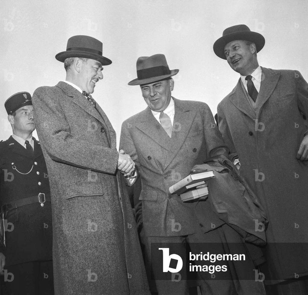 American Secretary of State Dean Acheson (l) welcome by  John McCloy (c) in Paris, May 1950 (b/w photo)