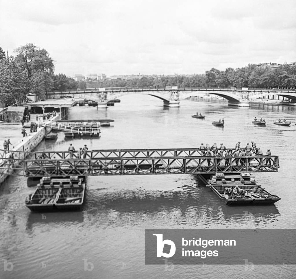 Bridge put by the  French sappers over the Seine river, Paris, July 13, 1951 (b/w photo)