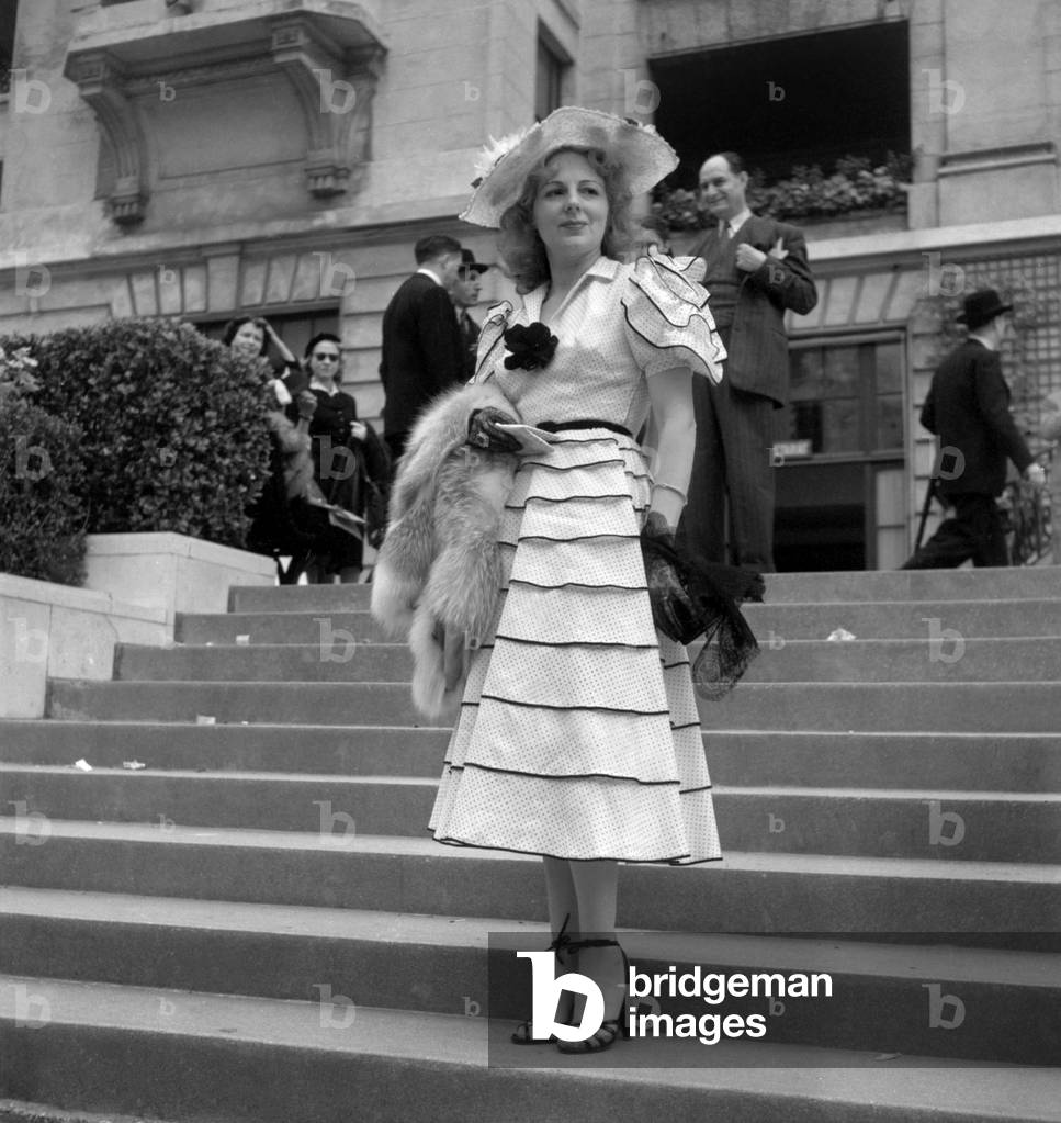 At The Grand Steeple Chase, Auteuil Hippodrome, France : June 22, 1952 : Model Wearing A Suit By Maggy Rouff (b/w photo)