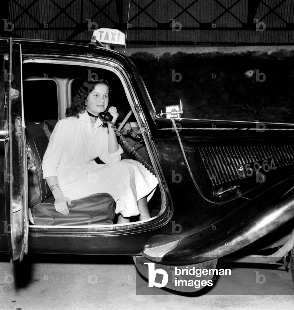A Model of Radio Taxi in Paris here October 20, 1955 The Phone Number For The Customers Is Port Royal 88-89 (b/w photo)