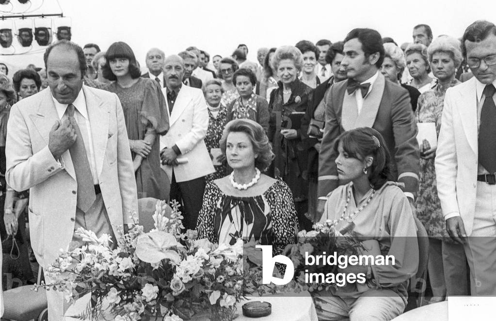 Princess Grace of Monaco and Princess Caroline of Carlo attending a show of jewels, Hotel Loews, Monte-Carlo, August 13, 1976 (b/w photo)