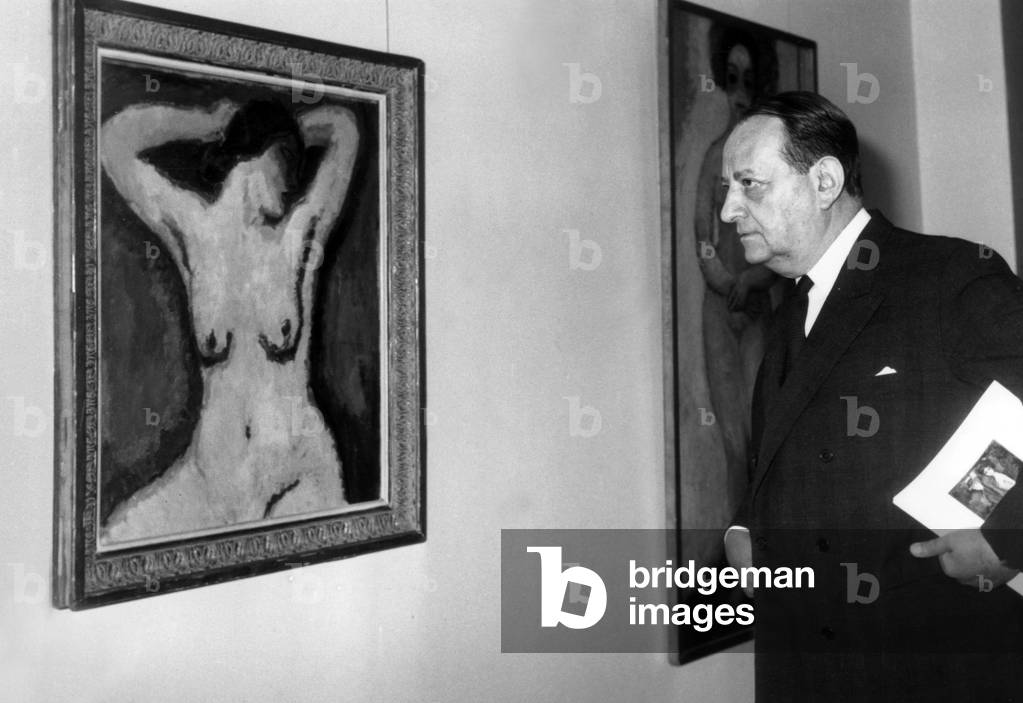 At The Exhibition About Van Dongen, French Minister of Culture in Front of The Portrait of Guus on October 13, 1967 (b/w photo)