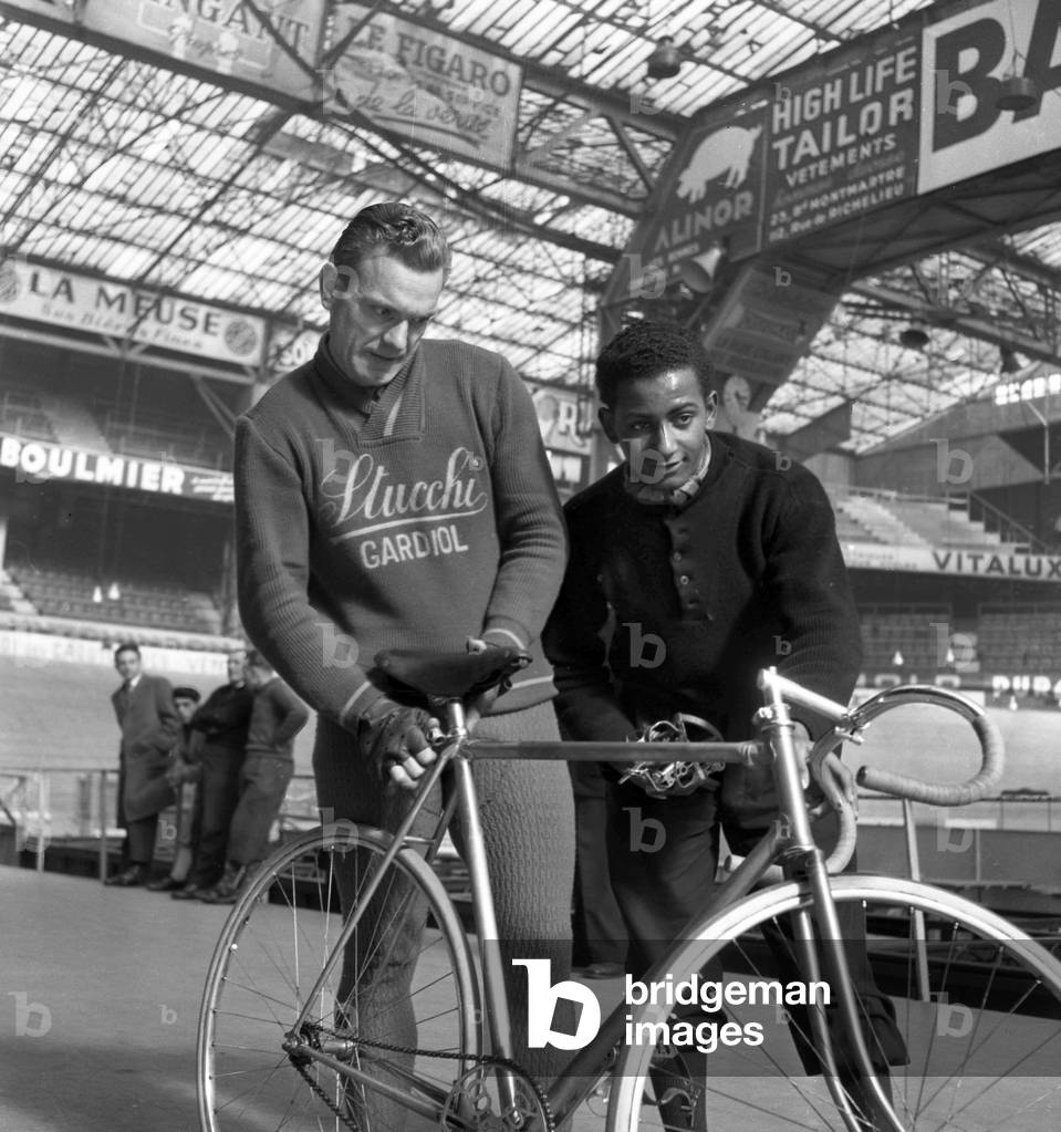 Les Six Jours De Paris (Cycling Race) at The Velodrome D'Hiver (Vel' D'Hiv) in Paris on March 22, 1949 : Italian Cyclist Severino Rigoni (b/w photo)