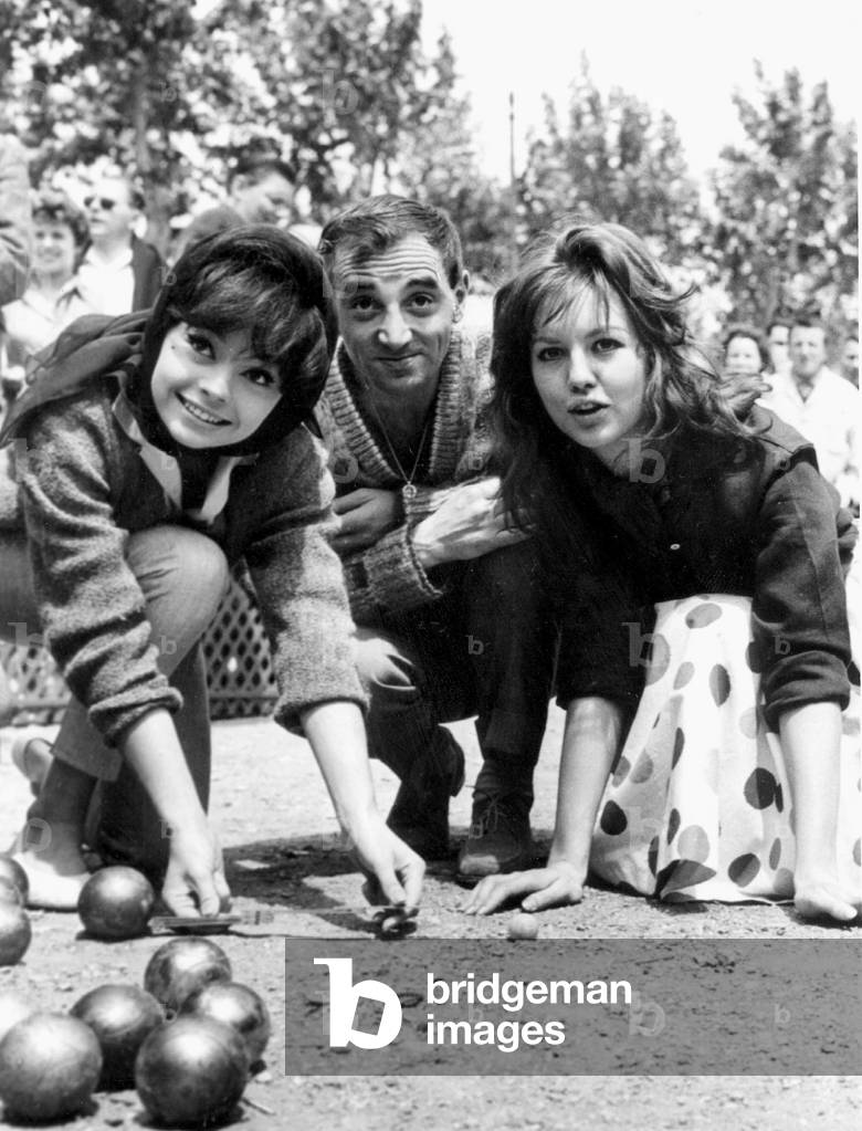 Pascale Petit, Charles Aznavour and Mylene Demongeot Playing Petanque during Cannes Film Festival March 28, 1959 (b/w photo)