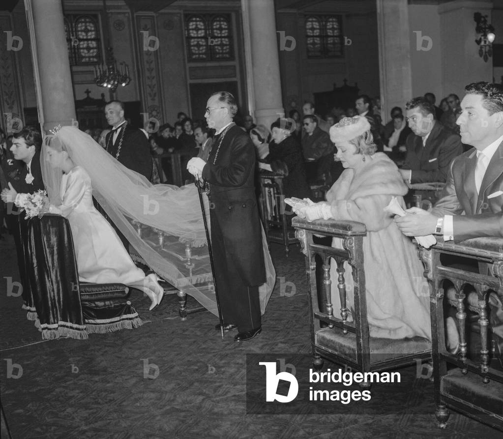 Wedding of Jacqueline Boyer and de Francois Lubiana at the church in Paris, November 30, 1960, on r : Lucienne Boyer and Jacques Pills (b/w photo)