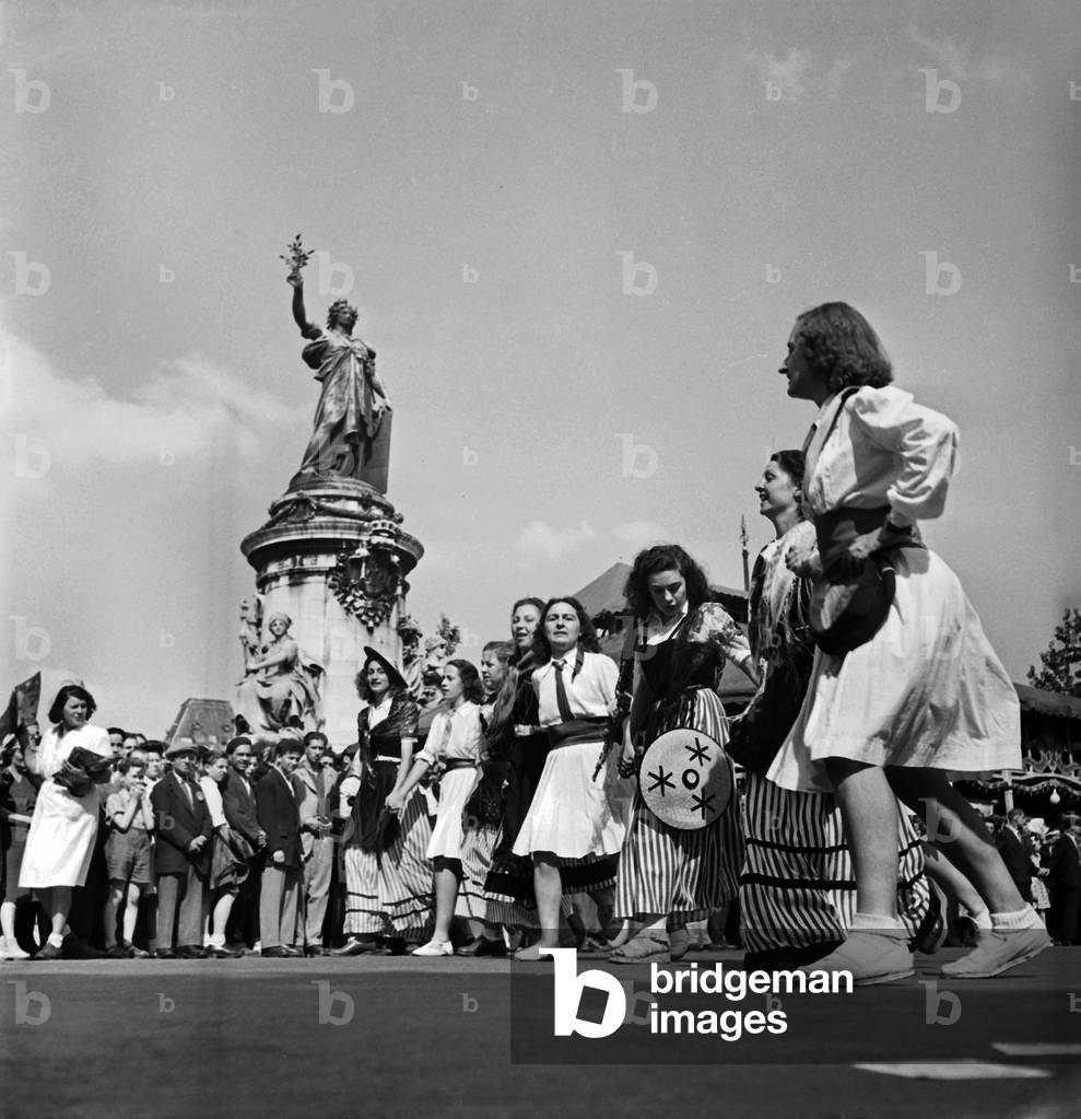 July 14, 1947, Paris (Place De La Republique) : Young Women Parading (b/w photo)