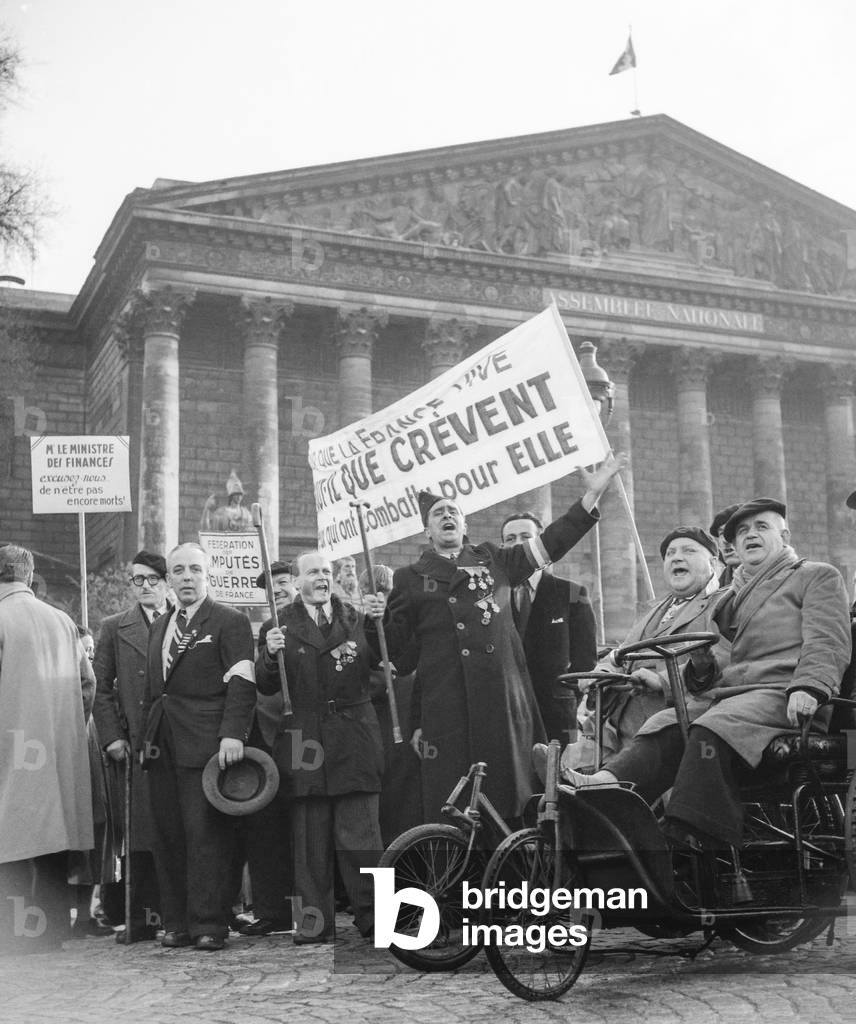 Demonstration of the disabled ex-servicemen in Paris, April 25, 1950 (b/w photo)