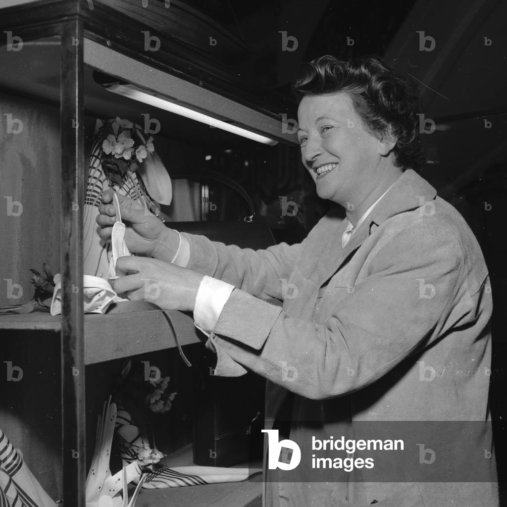 Annie Baumel, decorator, awarded at the French quality festival award, 1952