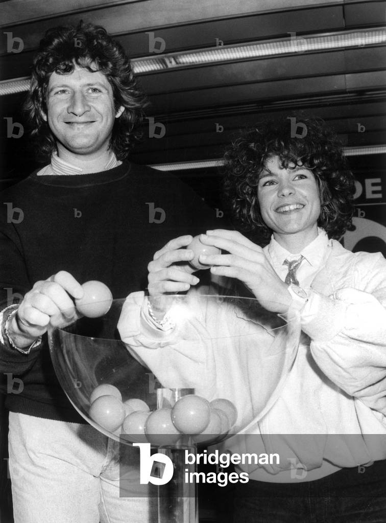 Patrick Sebastien and Sabine Paturel at the 32nd Final of the French Football Cup at the Palais de Congres de La Porte Maillot in Paris March 3, 1987 (b/w photo)