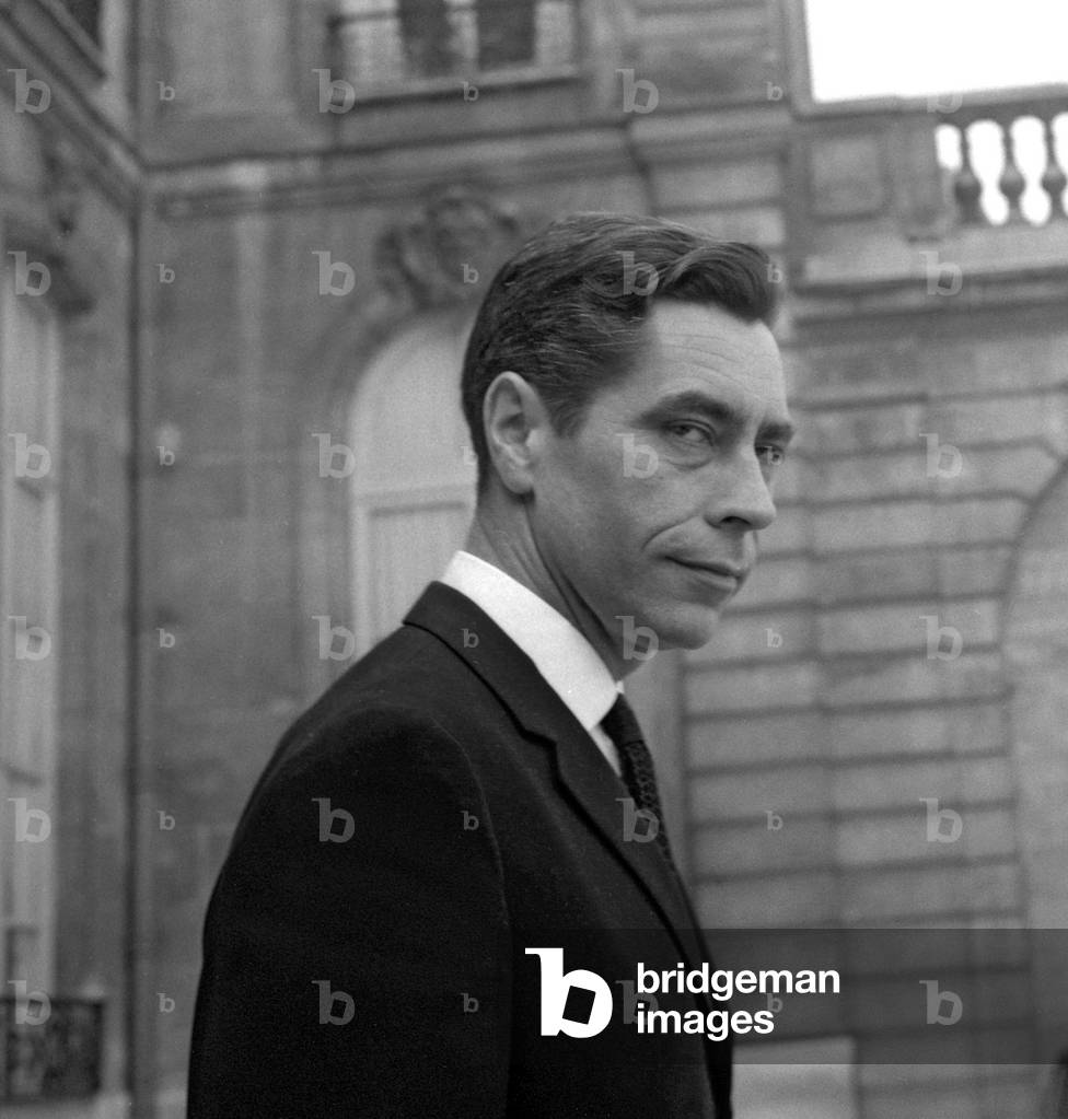 Yves Guena, French telecommunications Minister, leaving the Elysee in Paris after Council of Ministers, April 19, 1967 (b/w photo)