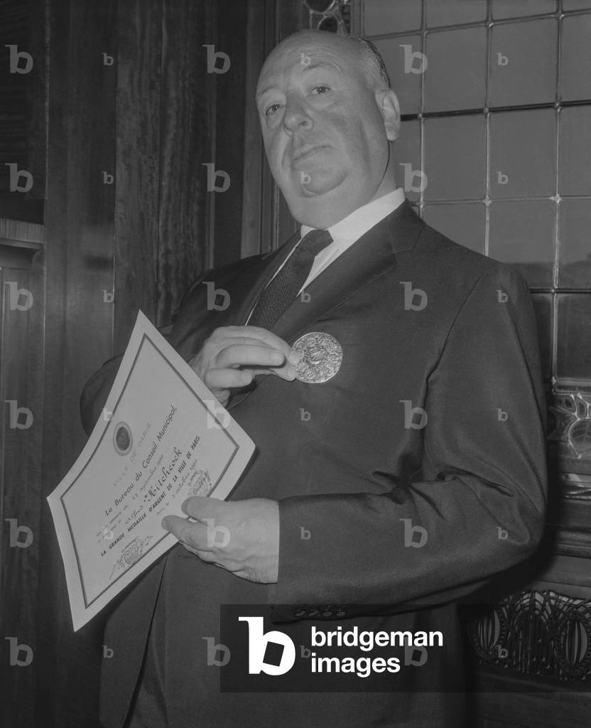 Alfred Hitchcock has received the City of Paris medal, October 4, 1960 (b/w photo)