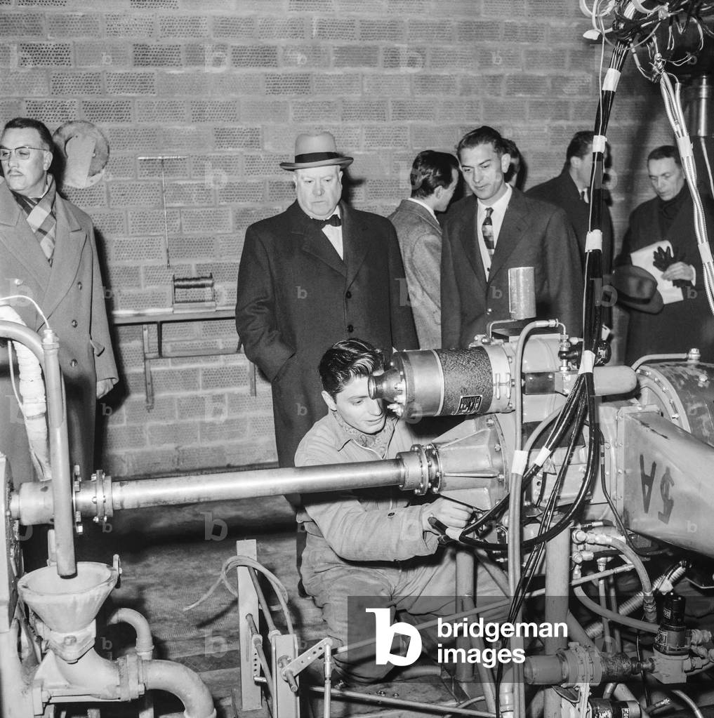 Turbomeca factory (gas turbine engines) in Bordes, France, February 20, 1958 : Louis Christiaens, French Secretary of State for Armed forces) visiting the factory (b/w photo)