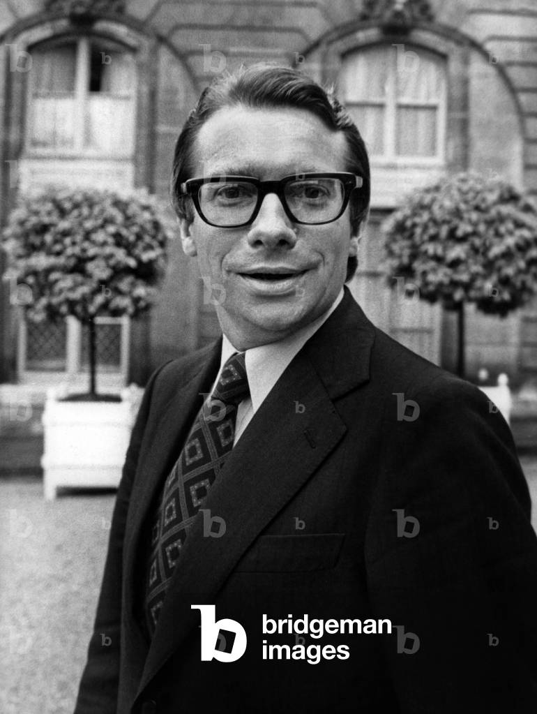 Mr Paul Dijoud Secretary of State to the Minister of Labour (Immigrant Workers) After Exceptionally Participating in the Council of Ministers Here Leaving Elysee After Council On 24 July 1974 (b/w photo)