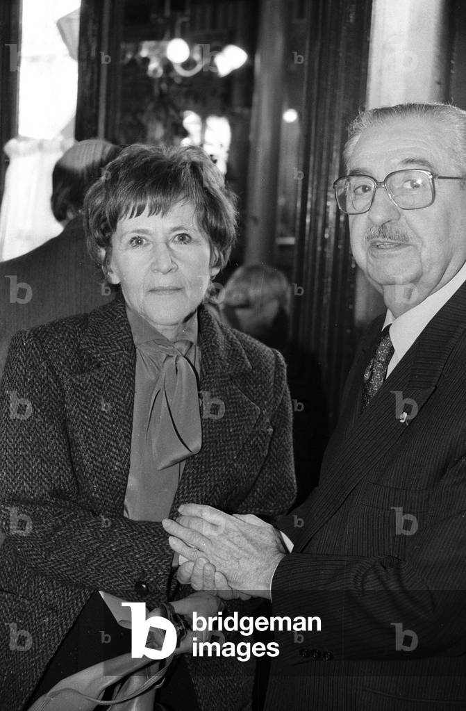 In Lipp Restaurant in Paris, Owner and Writer Roger Cazes Congratulating Writer Dominique Desanti Who Has Received A Prize March 21, 1984 (b/w photo)
