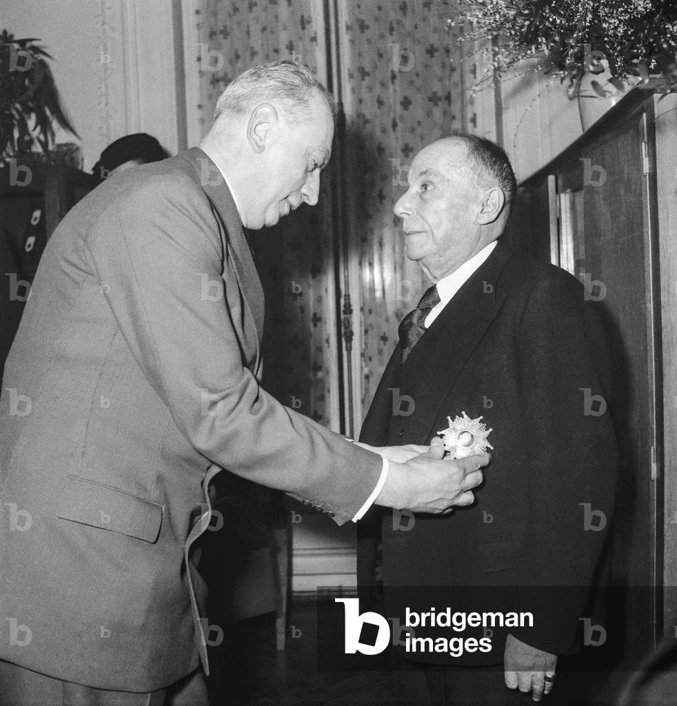 Georges Brouardel, President of the French Red Cross, receiving from French Health Minister Pierre Schneiter the Legion of Honour, Paris, Janaury 29, 1951 (b/w photo)