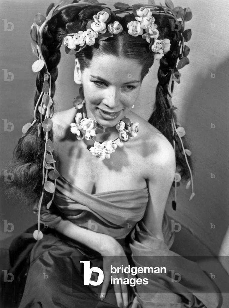 Model With Hairstyle By Carita and Alexandre : Lyre Model, April 29, 1953 (b/w photo)