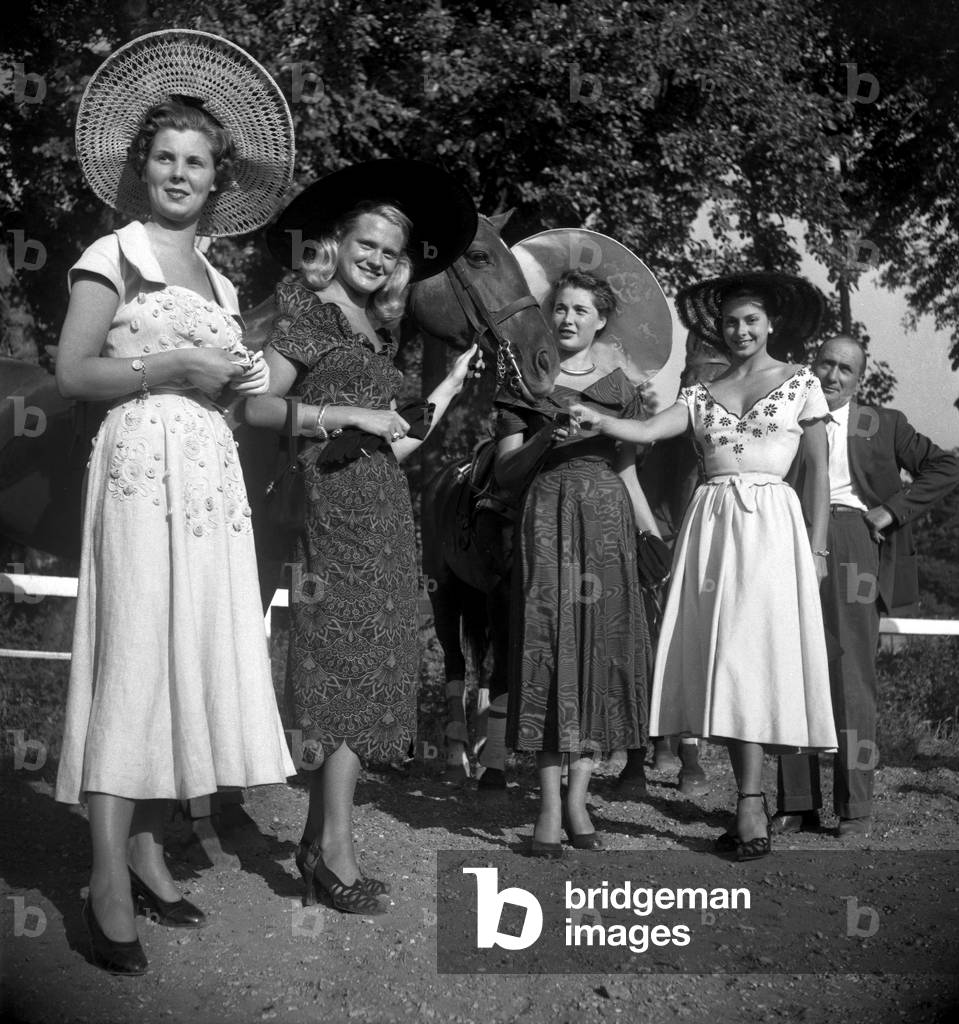 Elegant women at the polo, Bagatelle park, Paris, June 22, 1949 (b/w photo)