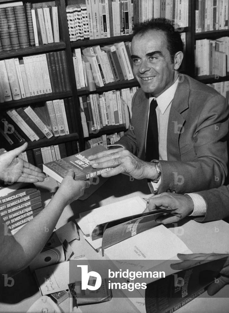 Georges Marchais, Secretary General of the French Communist Party Sign His Book “Le Defi Democratique” In A Bookshop Des Grands Boulevard A Paris September 19, 1973 (b/w photo)