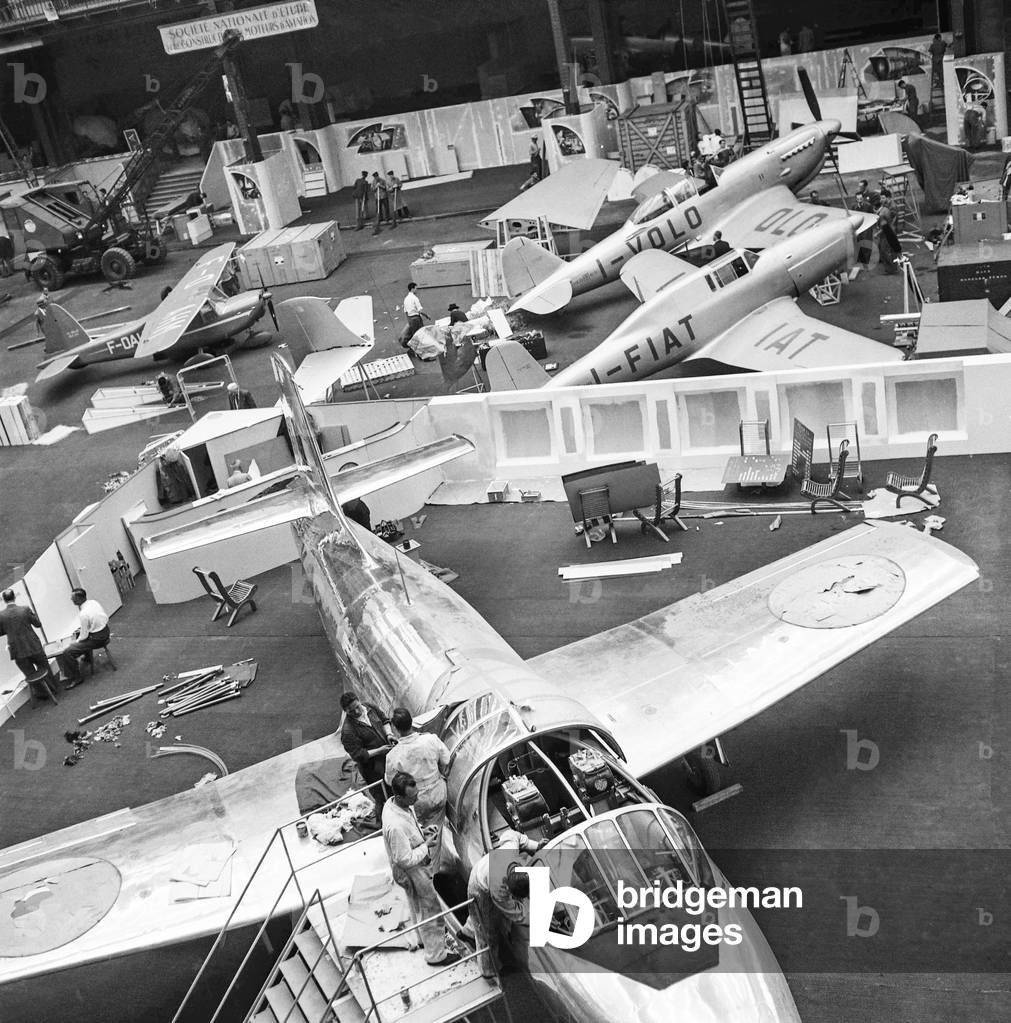 Preparation for the air show, at the Grand Palais in Paris, June 14, 1951 : the planes (b/w photo)